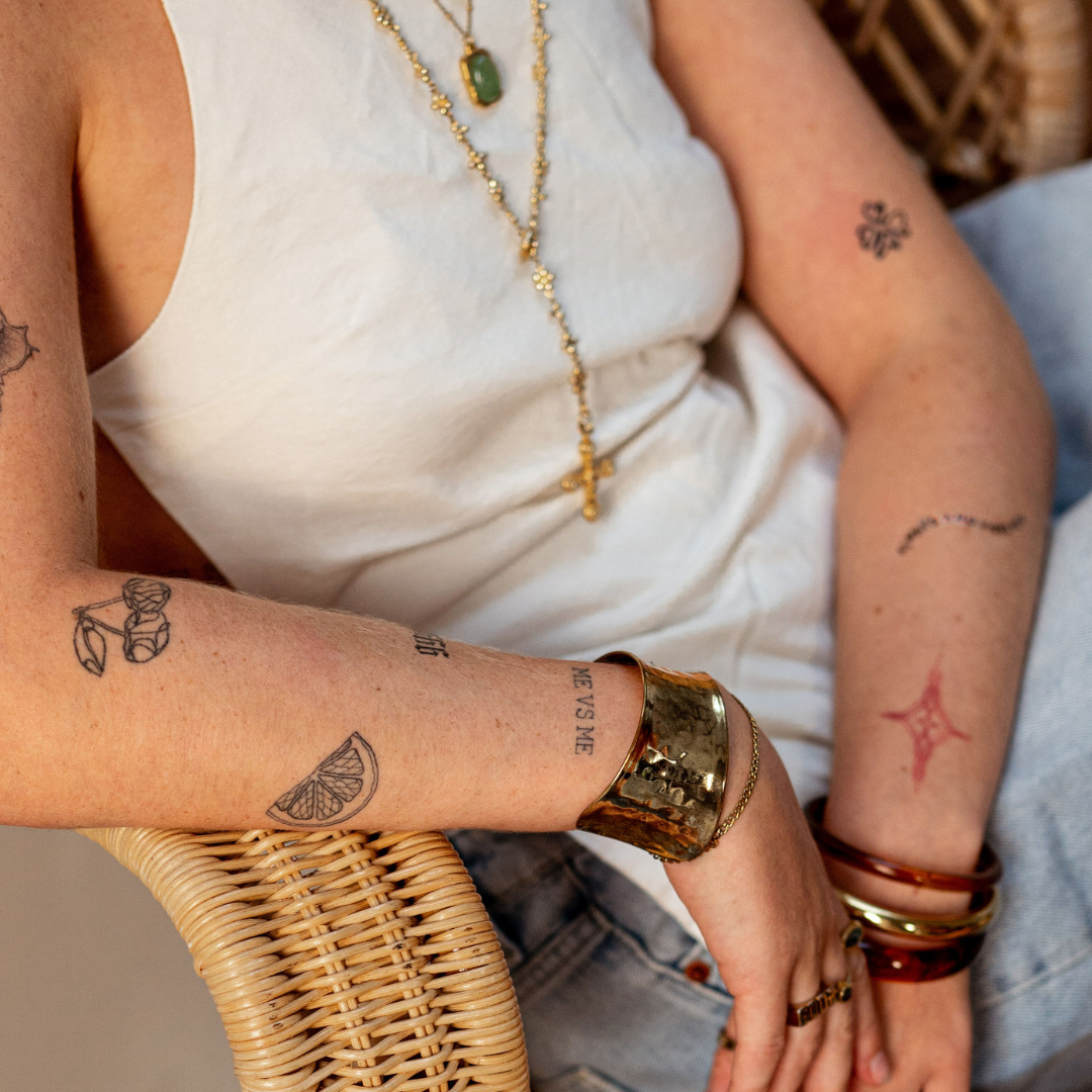 Smiley-tatoveringer: 10 glade designs til et smil på din hud