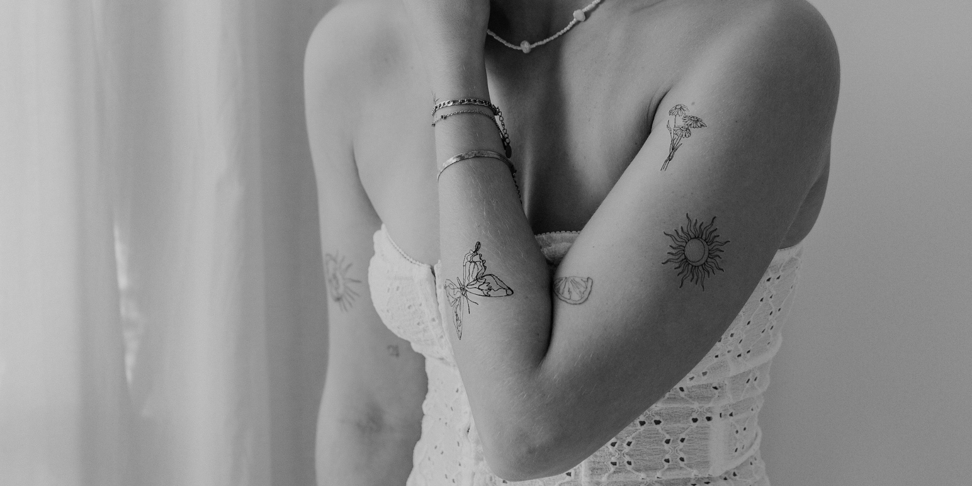 Tatovering af sommerfugl på underarmen: betydning, stilarter og inspiration