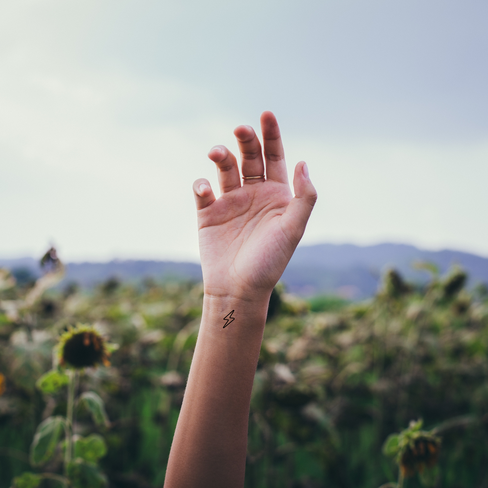 Small icon tattoo